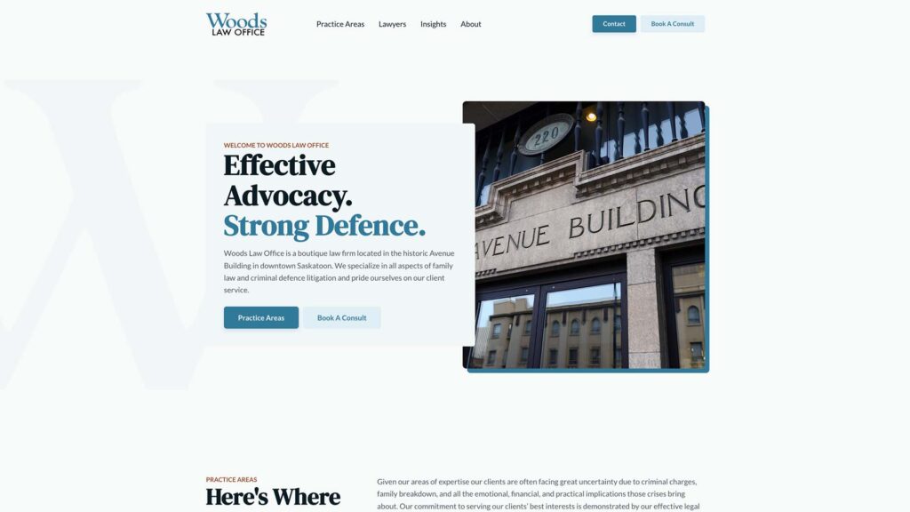 Device displaying web design for Woods Law Office