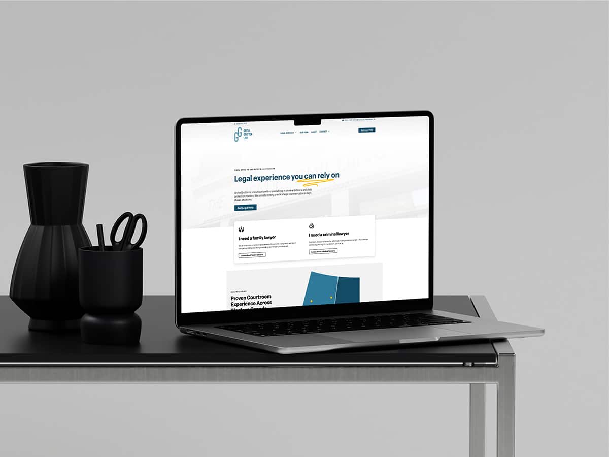 Device displaying the web design for Gryba Gratton