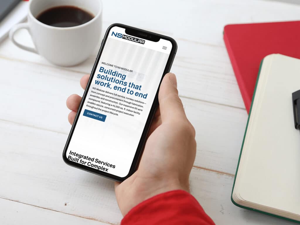 Device displaying the web design for NS Modular